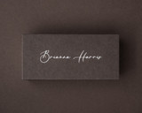 Personalised cocoa brown flat place card with a name printed in elegant white ink.