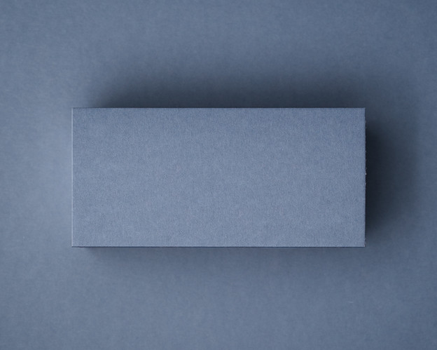 Airforce Blue flat place card in premium 300gsm cardstock, blank and unprinted, photographed on matching background.