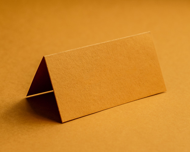 Mustard folded place card on premium 380gsm card, blank, ready for personalisation.