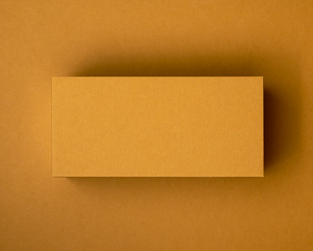 Blank Mustard flat place card made from 380gsm matte cardstock, ready for white or black ink customisation for weddings, parties, or events.