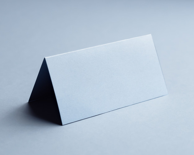 Powder blue folded place card in 250gsm card, blank and ready for customisation.