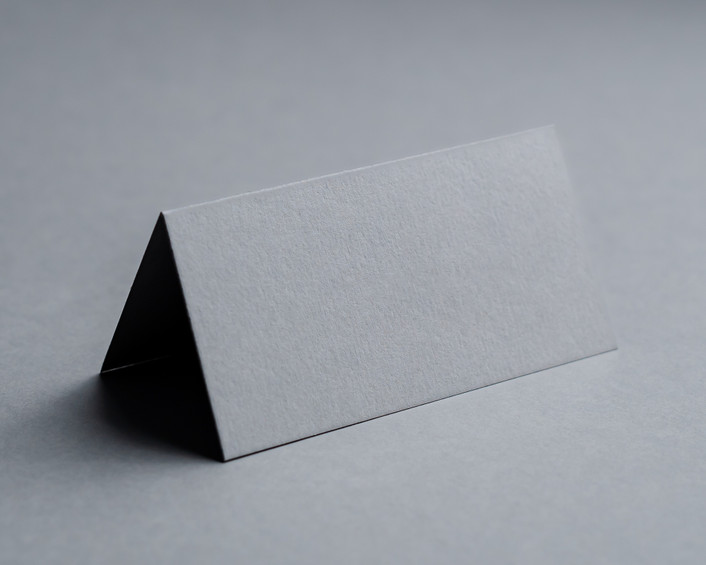 Blank mid grey folded place card on 270gsm card, supplied flat and scored for easy folding.