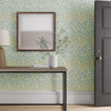 Morris & Co Willow Boughs Willow Sea Glass wallpaper styled in hallway with console table, framed artwork and decorative vase
