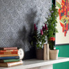 Close-up of Anaglypta Deco Paradiso Wallpaper in Living Room painted grey.