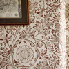 Morris & Co Chamomile Wallpaper Flax Madder detail showing floral pattern wrapping around corner with framed artwork and textured wall finish