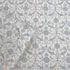 Close-up of Laura Ashley Endale Trellis wallpaper in Newport Blue showing printed detail and open roll