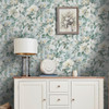 Interior styled with Laura Ashley Elowen Peony pale teal floral wallpaper creating a calm and elegant room setting