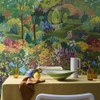 Little Greene Castle Garden mural wallpaper in Pale Lime creating an immersive garden backdrop in a contemporary room