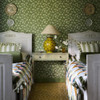 Styled room interior with Little Greene Moon Daisies wallpaper in Olive, demonstrating how the playful floral pattern adds character without overwhelming the space