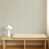 Scion Hares Coast Blue wallpaper used behind a wooden bench, highlighting delicate blue hare design.