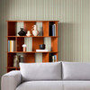 Made Kyria Mint Chocolate Stripe wallpaper in modern living room with narrow vertical stripe design.