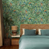 Holden Decor Lemur Leaves Aqua Green wallpaper used on bedroom wall featuring tropical jungle foliage and lemurs