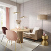 Galerie textured wallpaper feature wall with sofa and dining area styling