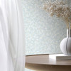 Galerie soft green floral wallpaper feature wall light airy interior styling