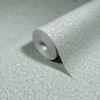 green wallpaper roll showing textured plaster effect finish and subtle tonal variation