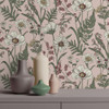 blush wildflower wallpaper feature wall with decorative vases and soft interior styling