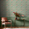 spring garden wallpaper feature wall with table, chair and warm interior styling