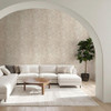 pearl tropical wallpaper feature wall with curved sofa and modern interior styling