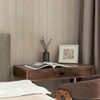 pearl stripe wallpaper feature wall with bedside table, lamp and neutral bedroom styling