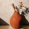 textured beige wallpaper with warm interior decor