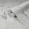 close up of wallpaper roll showing smooth texture and shimmer finish