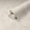 close up of wallpaper roll showing smooth texture and shimmer finish