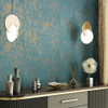 concrete look wallpaper feature wall with cabinet, vases and modern interior styling