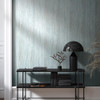 textured white wallpaper in modern living space with console table and decorative objects