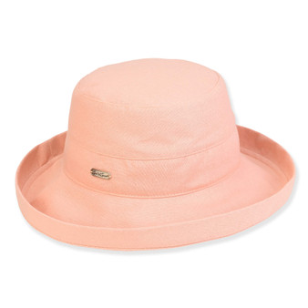 Front view of a peach-colored sun hat made of textured canvas, featuring a wide upturned brim and silver logo hardware.