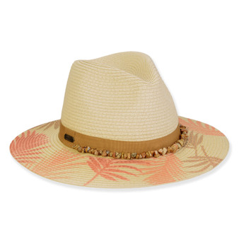 Three-quarter view of a cream woven fedora featuring a shell-embellished tan band and a pink palm leaf print brim.