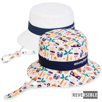 Three-quarter view of a reversible kids' bucket hat featuring a summer beach print side and a solid white side.
