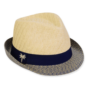 Three-quarter view of a cream straw fedora featuring a navy grosgrain band with a palm tree embroidery and blue patterned brim.