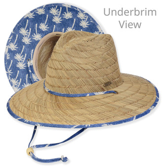 Three-quarter view and underbrim detail of a natural straw outback hat with blue palm print binding, chin strap, and wooden toggle.