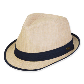 Three-quarter view of a tan linen fedora featuring a navy fabric band with an oval metal logo and matching brim piping.