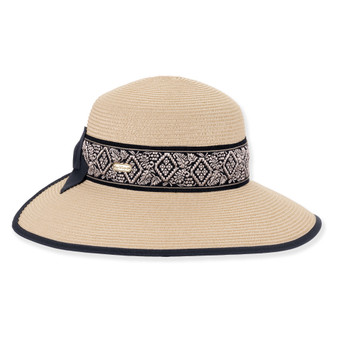 Front three-quarter studio view of Sun N Sand backless hat featuring tan woven texture, geometric embroidered band and black piping
