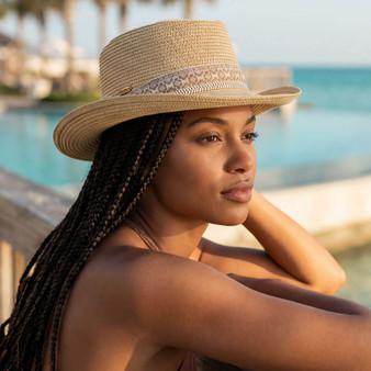 Front angled view of the Sun N Sand gambler hat in natural woven straw, featuring patterned decorative band and adjustable design for UPF protection