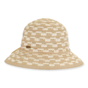 Front view beige and white woven bucket hat with wide brim, checkered straw texture, thin band, rounded crown, and small metallic tag.