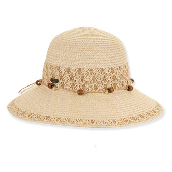 Front view beige woven bucket hat with wide brim, crochet style detailing, wooden bead band, rounded crown, textured weave, and small metallic tag.