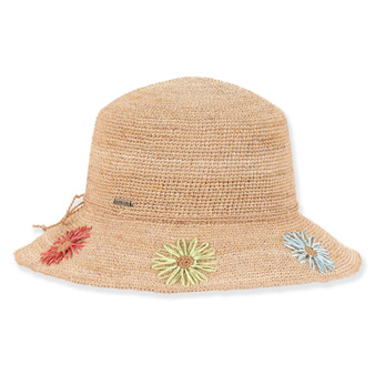 Three-quarter profile view of a tan crocheted straw bucket hat featuring a rounded crown, rope trim, and colorful floral embroidery.