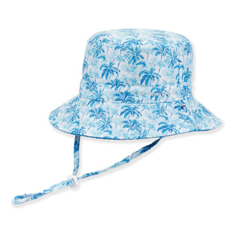Three-quarter view of a light blue bucket hat featuring all-over palm tree and surfboard prints with an adjustable chin strap.