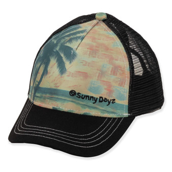 Three-quarter view of a black trucker hat featuring a tropical sunset-print crown with palm trees and breathable mesh back.