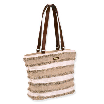 side  view of a rectangular tan and cream striped woven straw tote bag featuring horizontal fringe rows and dark handles.