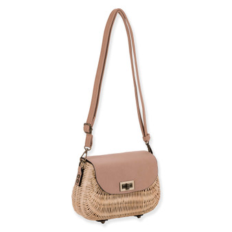 side view of a woven straw crossbody bag with beige flap, gold clasp hardware, and adjustable strap showcasing textured summer design.