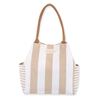 Front view of tan striped canvas tote, brown woven straps, side slip pockets.