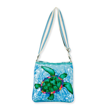 Front view of teal Sun 'N' Sand Sea Turtle crossbody bag featuring beaded turtle applique, blue-striped strap, and canvas texture.