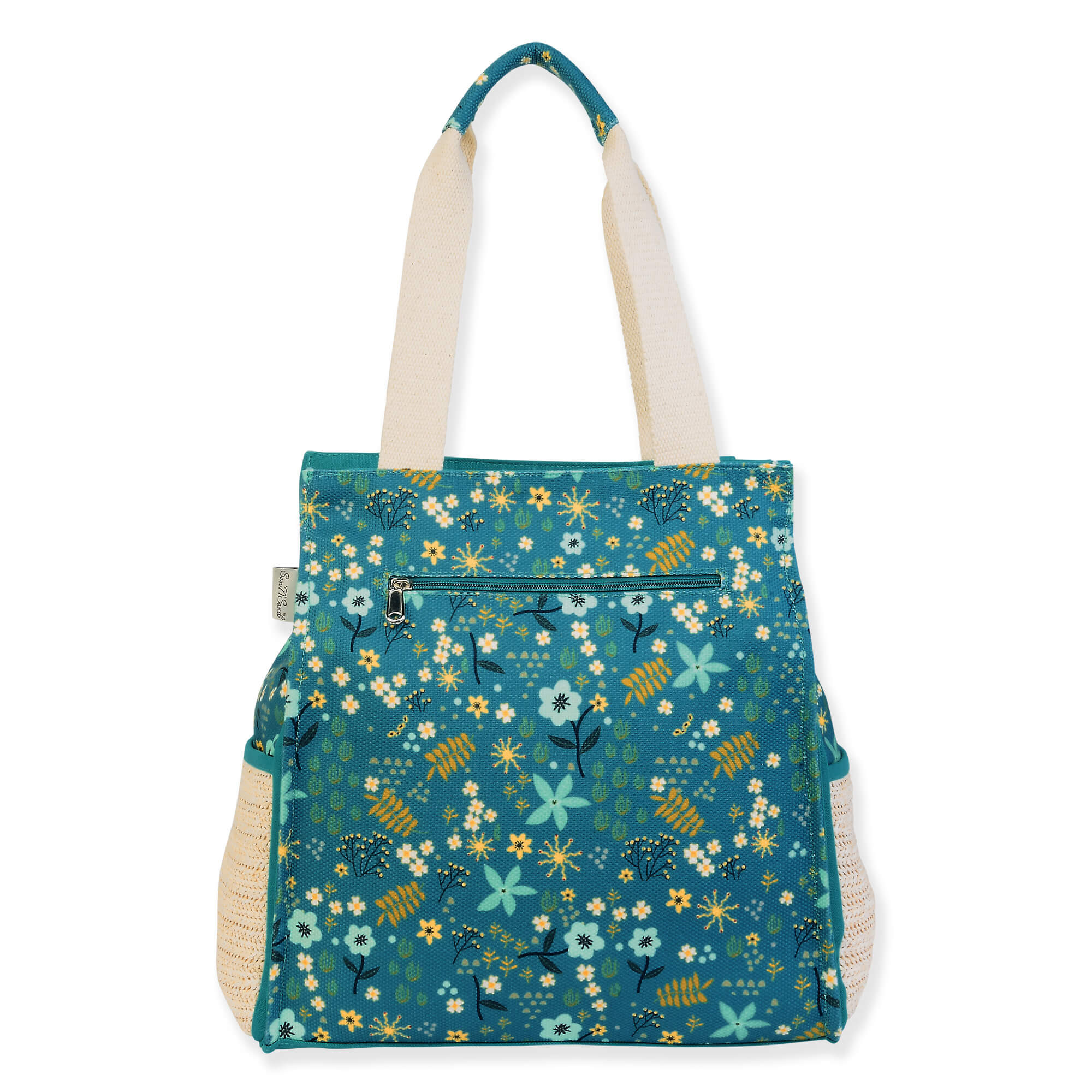 Canvas beach tote bag with teal floral pattern, textured fabric panels, reinforced side pockets, wide shoulder handles, soft rectangular shape, back view shown