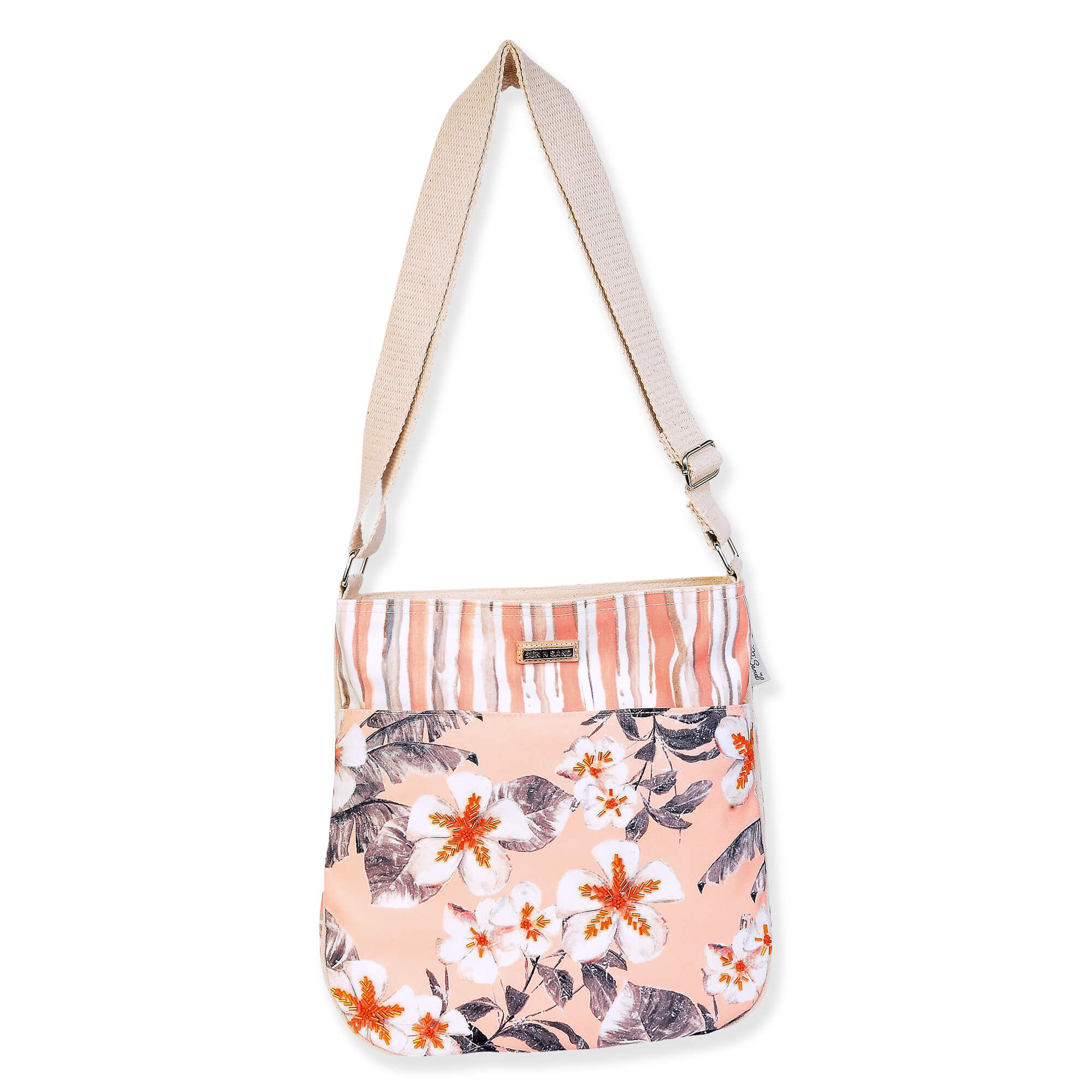 crossbody bag with floral and striped fabric insert, adjustable beige shoulder strap, rectangular silhouette, zipper top, product image.