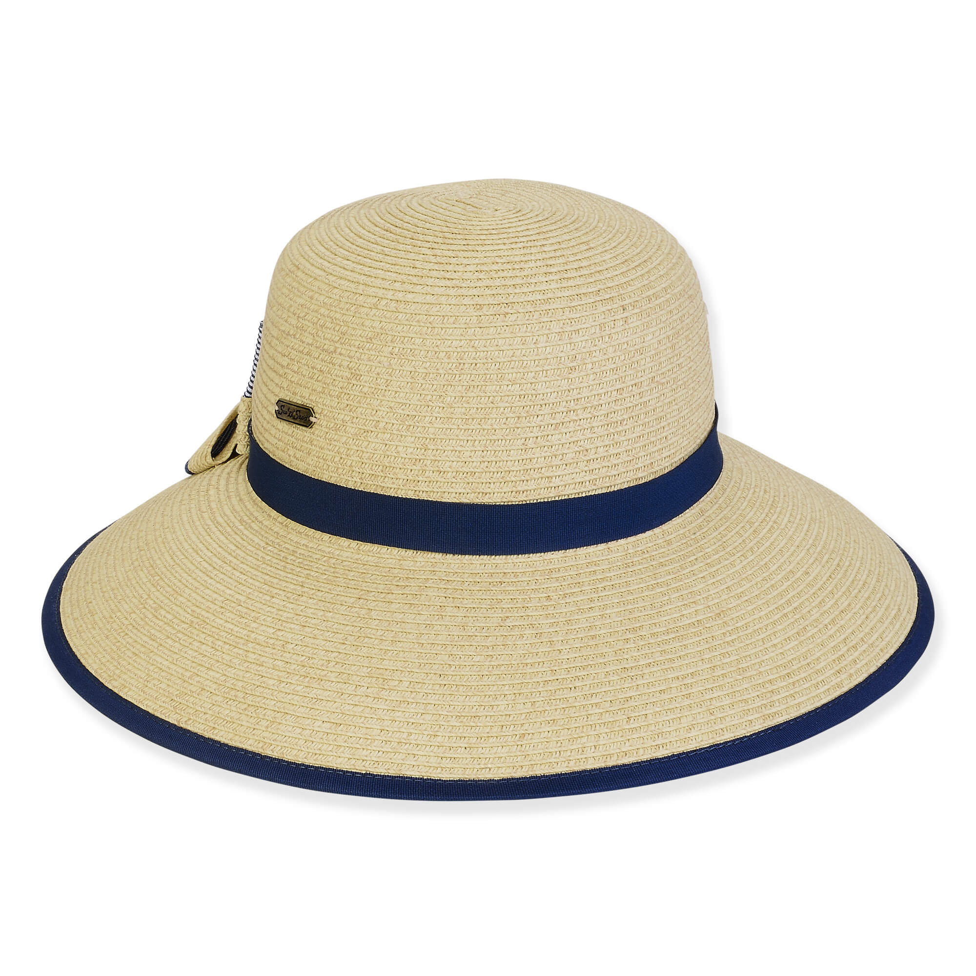 Three-quarter view of a tan woven straw sun hat featuring a rounded crown and a navy blue ribbon band.