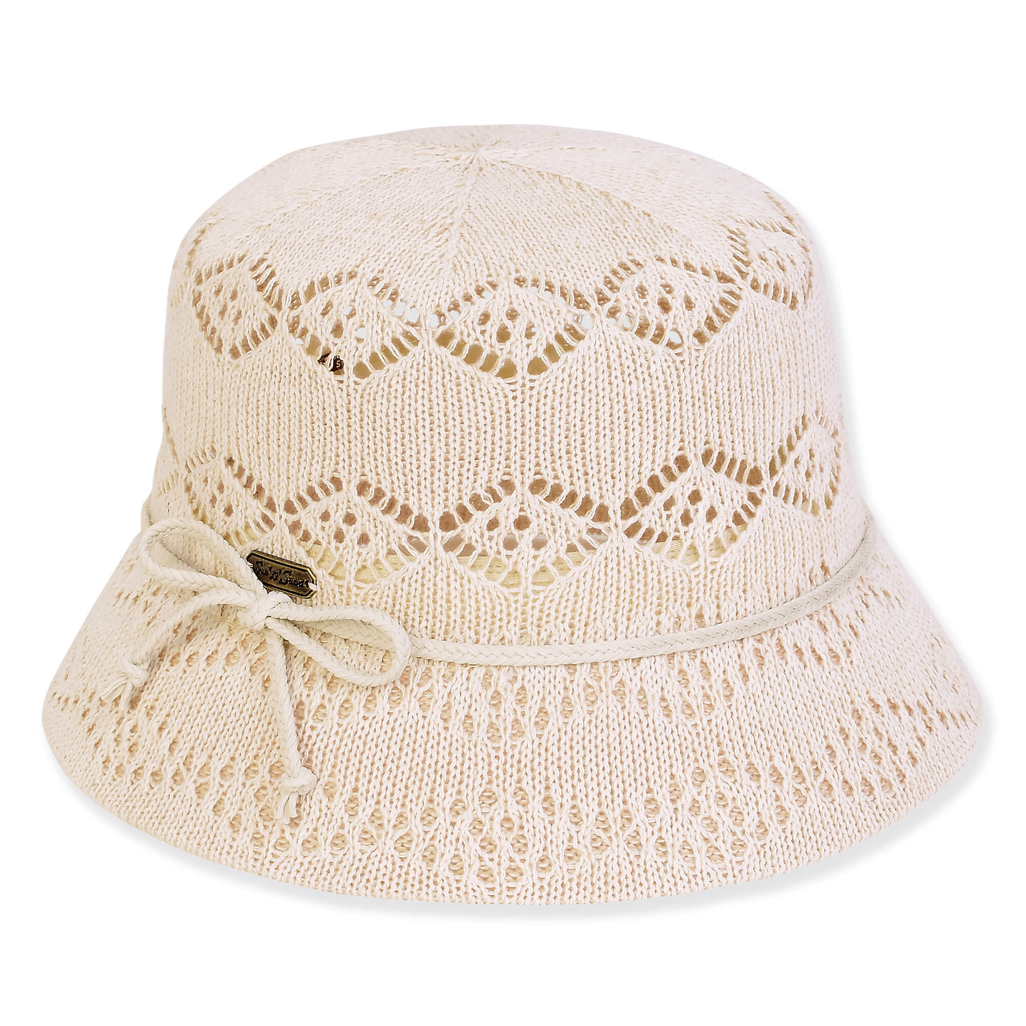 Three-quarter view of a white crochet bucket hat featuring diamond-patterned open-work knits, a matching cord band, and a narrow brim.