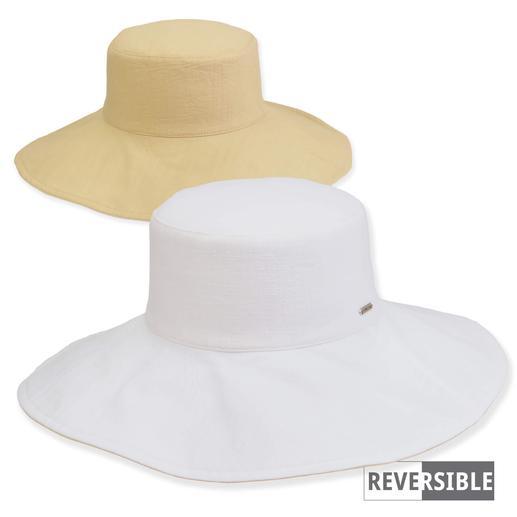 Product view of a reversible sun hat showing white and cream canvas textures with a wide, flexible, sun-protective brim.